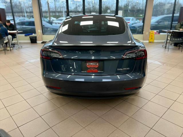 used 2022 Tesla Model 3 car, priced at $28,901
