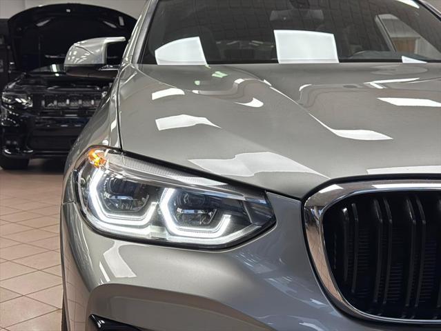 used 2021 BMW X4 M car, priced at $45,500