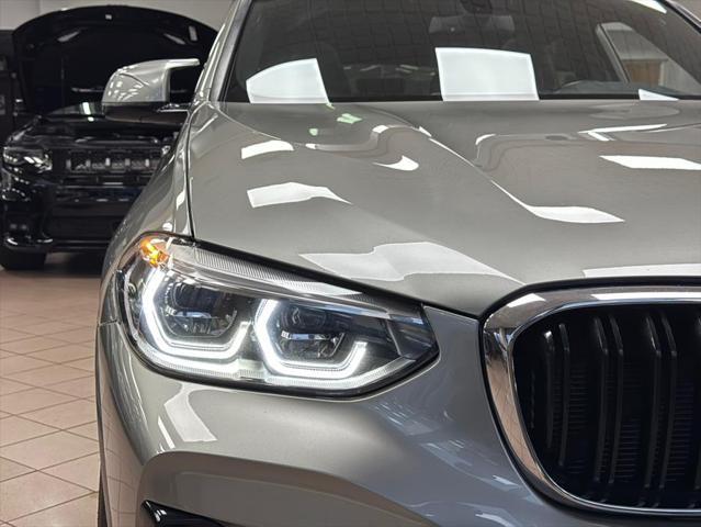 used 2021 BMW X4 M car, priced at $39,900