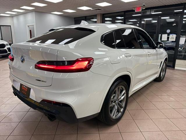 used 2021 BMW X4 car, priced at $28,700