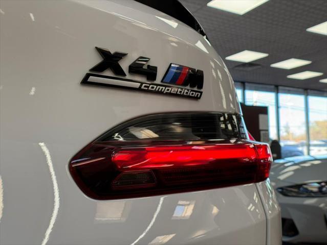 used 2021 BMW X4 M car, priced at $47,900