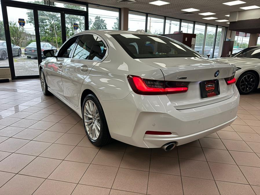 used 2024 BMW 330 car, priced at $29,100