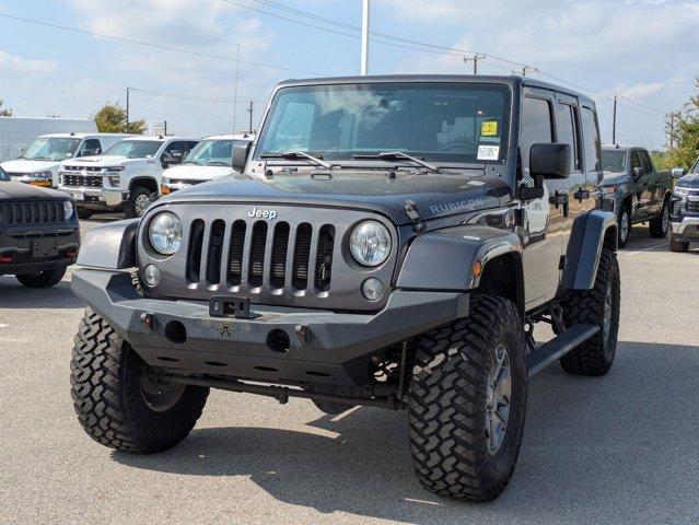 used 2016 Jeep Wrangler Unlimited car, priced at $19,363