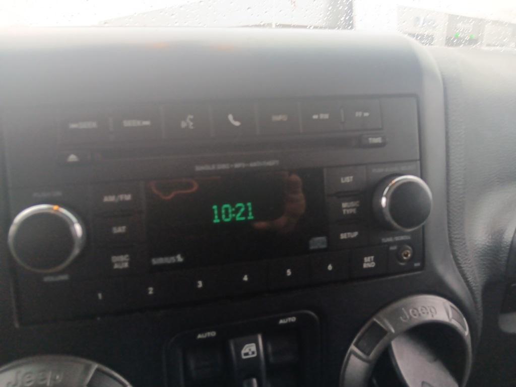 used 2015 Jeep Wrangler Unlimited car, priced at $14,300