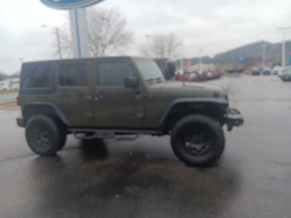 used 2015 Jeep Wrangler Unlimited car, priced at $14,300
