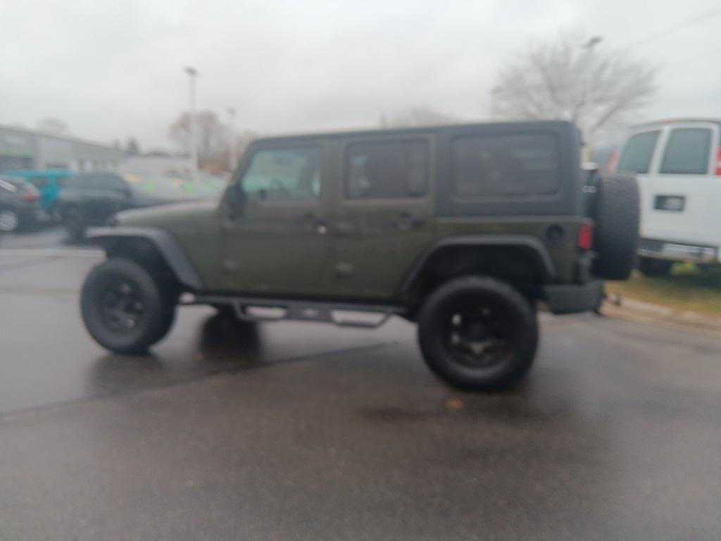 used 2015 Jeep Wrangler Unlimited car, priced at $14,300