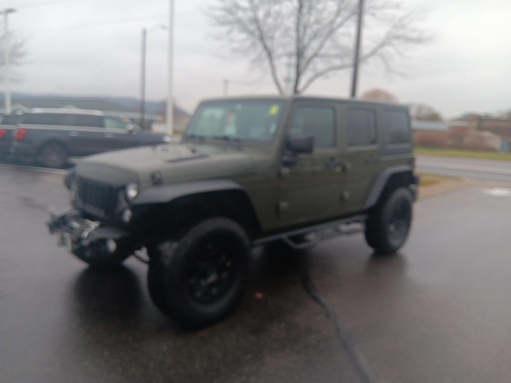 used 2015 Jeep Wrangler Unlimited car, priced at $14,300