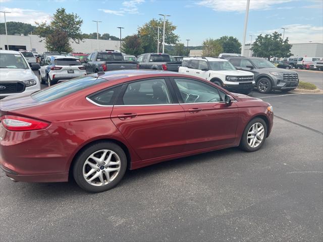 used 2014 Ford Fusion car, priced at $10,890