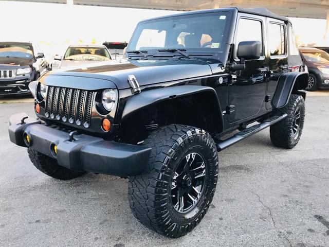 used 2012 Jeep Wrangler Unlimited car, priced at $16,995