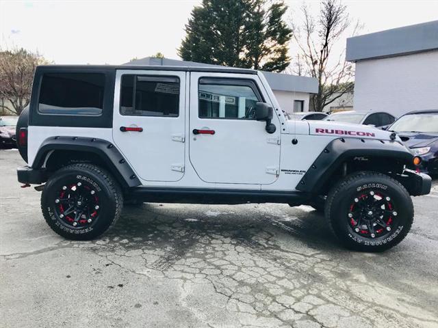 used 2014 Jeep Wrangler Unlimited car, priced at $22,995