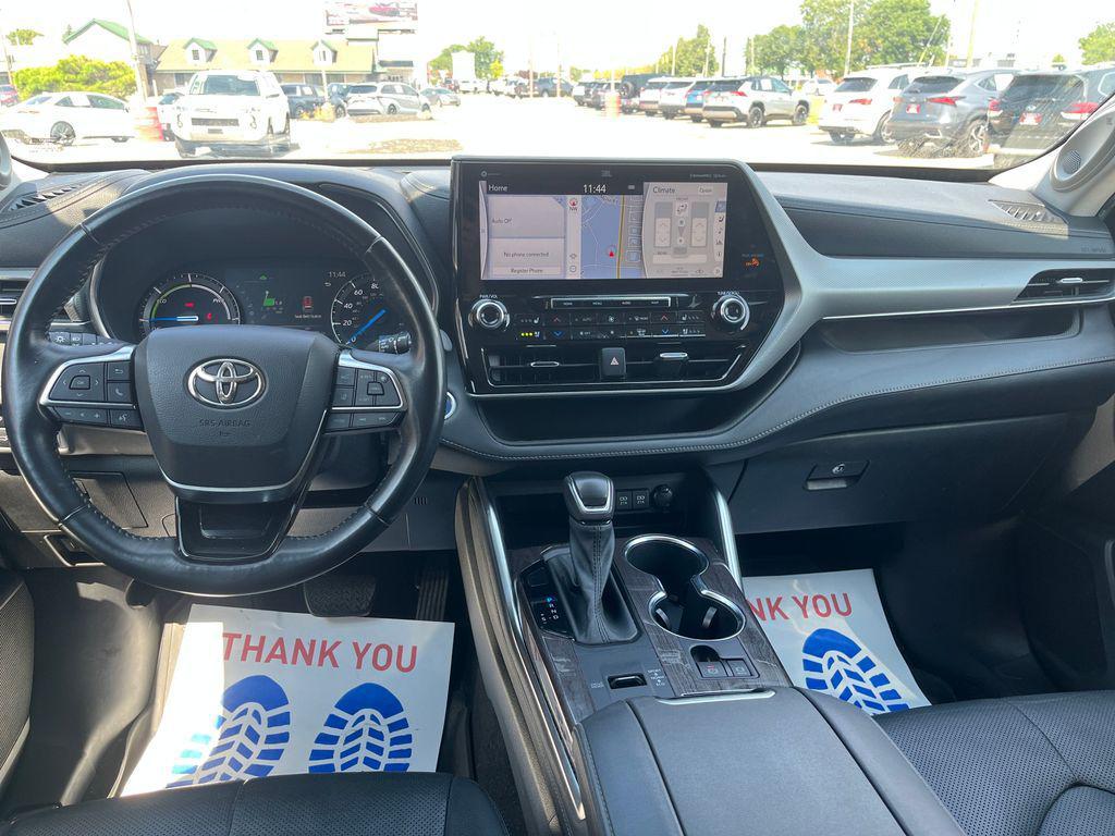 used 2021 Toyota Highlander Hybrid car, priced at $31,424