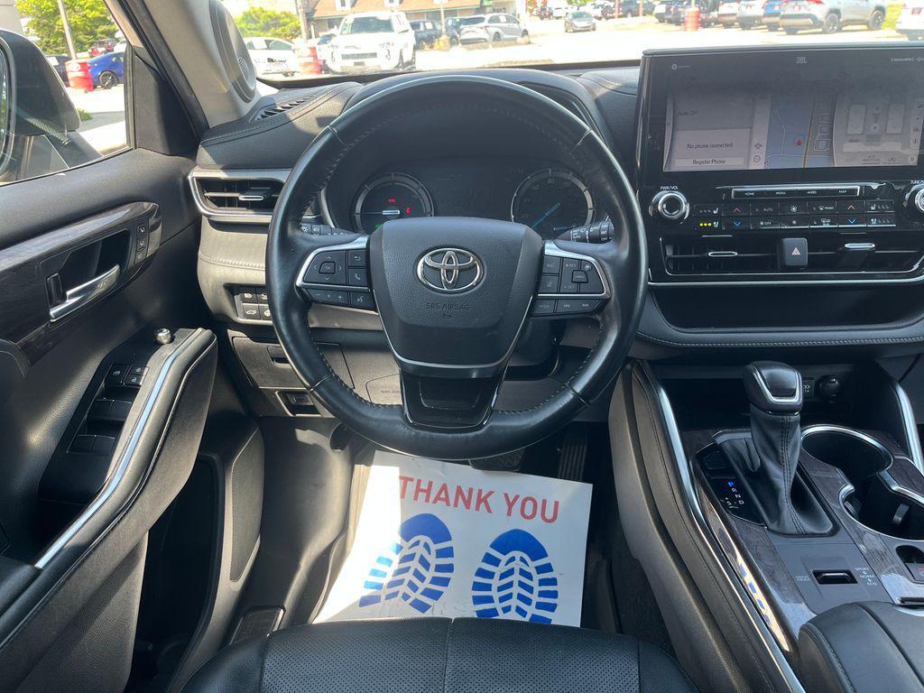 used 2021 Toyota Highlander Hybrid car, priced at $31,424