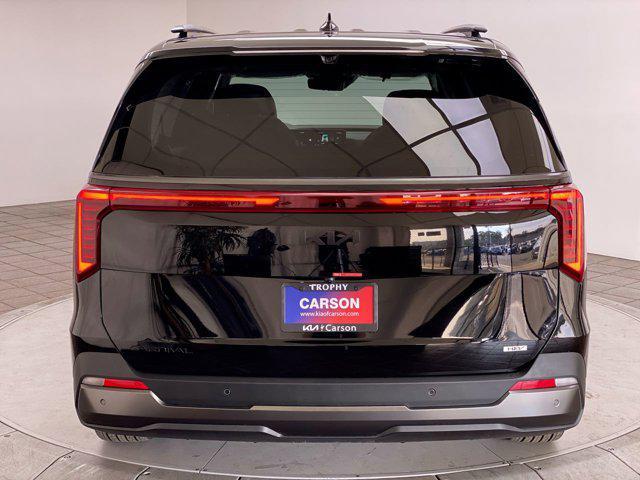 new 2025 Kia Carnival Hybrid car, priced at $54,955