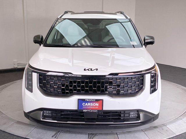 new 2025 Kia Carnival Hybrid car, priced at $57,660
