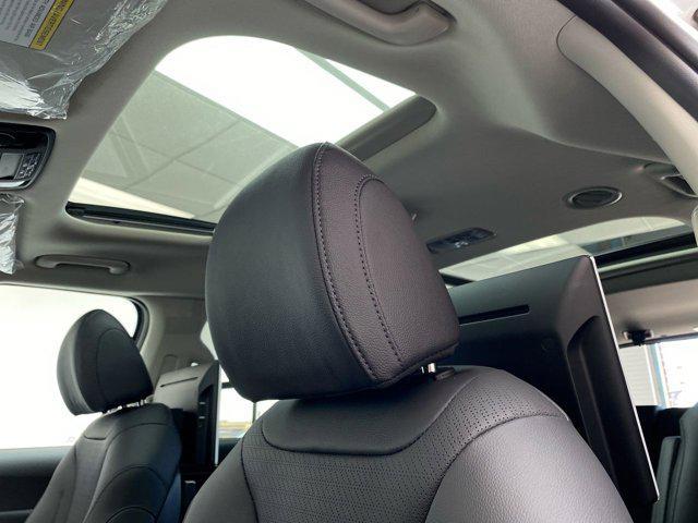 new 2025 Kia Carnival Hybrid car, priced at $57,595