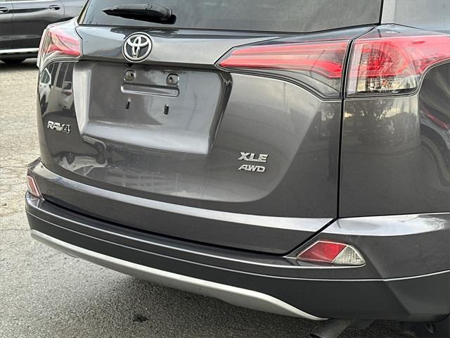 used 2018 Toyota RAV4 car, priced at $19,250