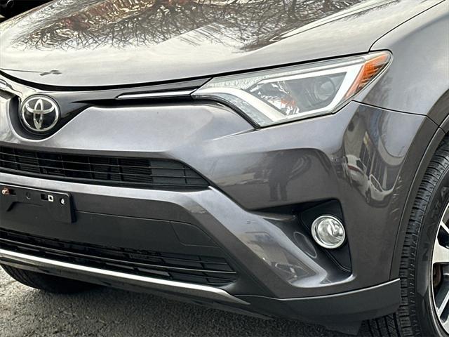 used 2018 Toyota RAV4 car, priced at $19,250