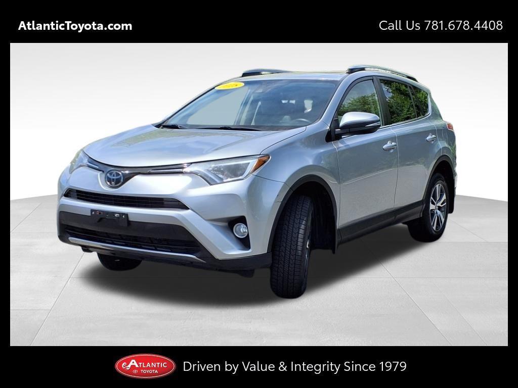 used 2018 Toyota RAV4 car, priced at $20,000