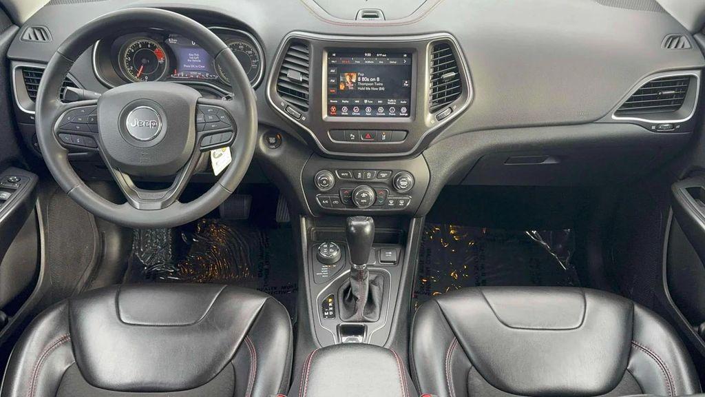 used 2021 Jeep Cherokee car, priced at $19,495