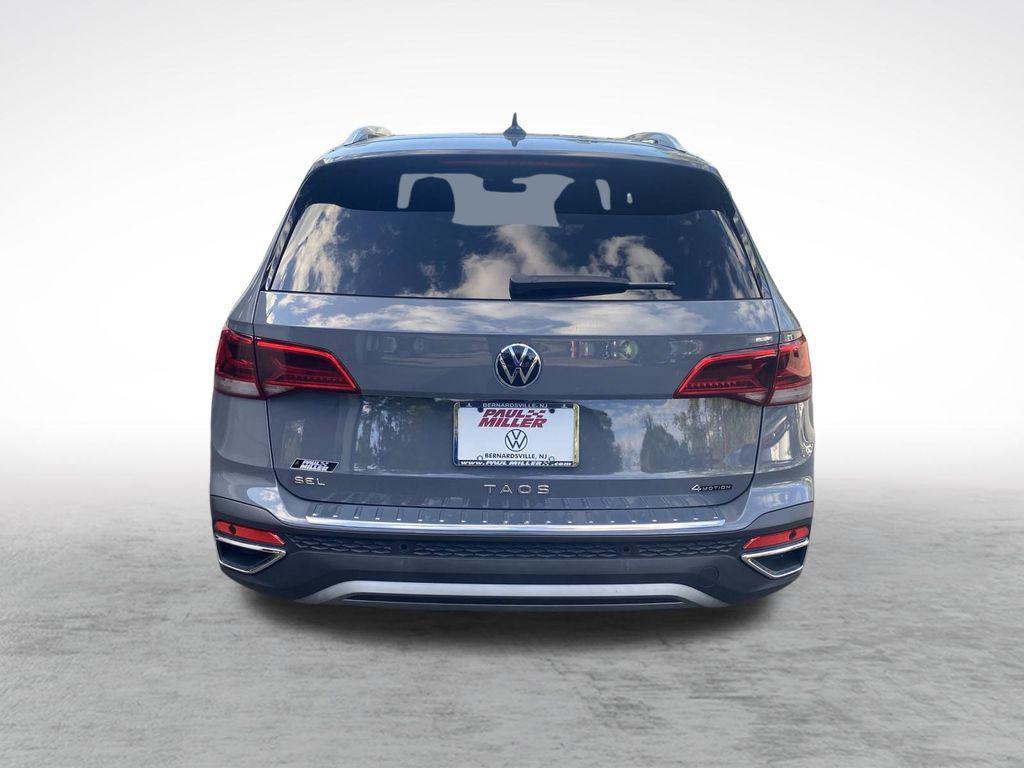 used 2022 Volkswagen Taos car, priced at $23,422