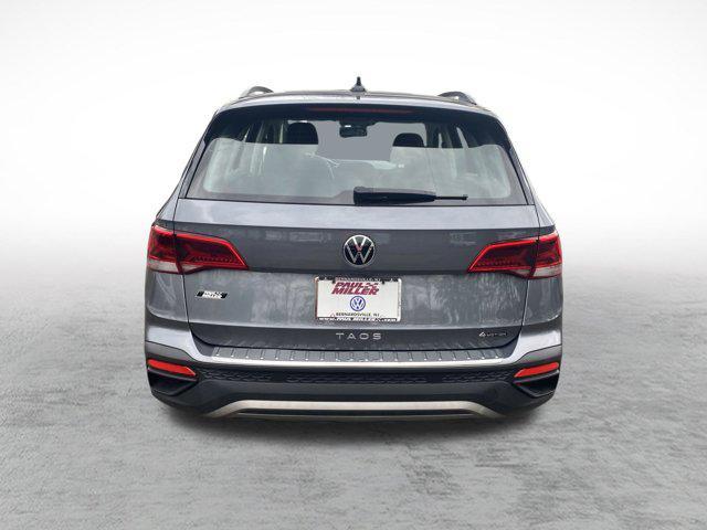 used 2022 Volkswagen Taos car, priced at $19,595