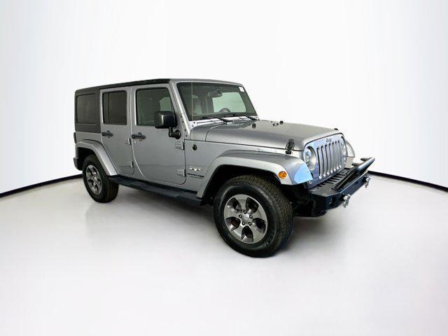 used 2018 Jeep Wrangler JK Unlimited car, priced at $23,303