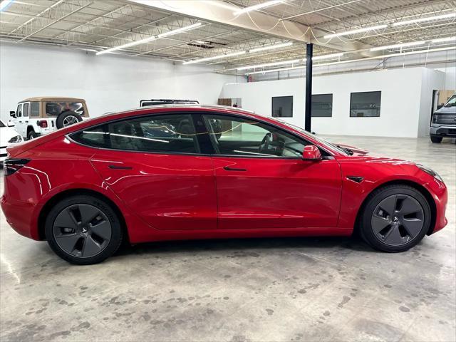used 2022 Tesla Model 3 car, priced at $25,000