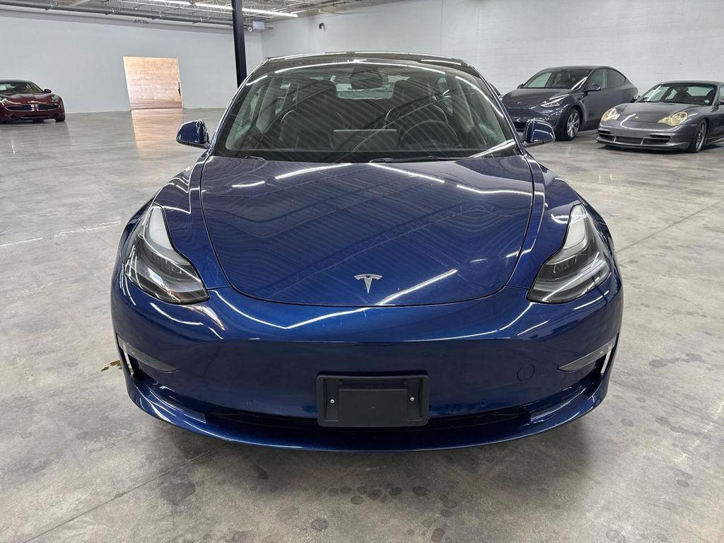 used 2022 Tesla Model 3 car, priced at $18,000