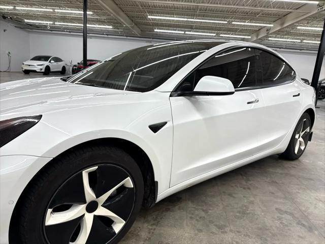 used 2022 Tesla Model 3 car, priced at $17,500