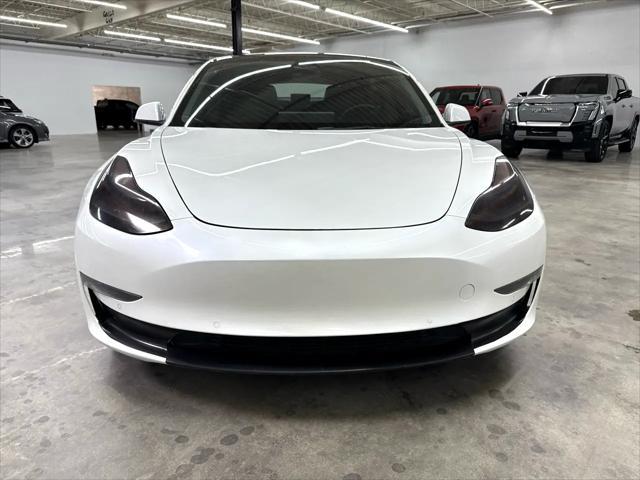 used 2022 Tesla Model 3 car, priced at $17,500