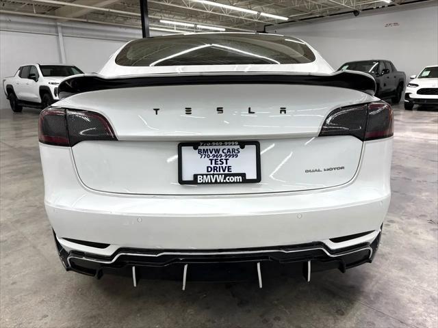 used 2022 Tesla Model 3 car, priced at $17,500