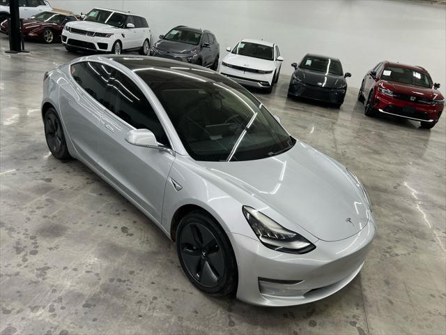 used 2018 Tesla Model 3 car, priced at $17,000