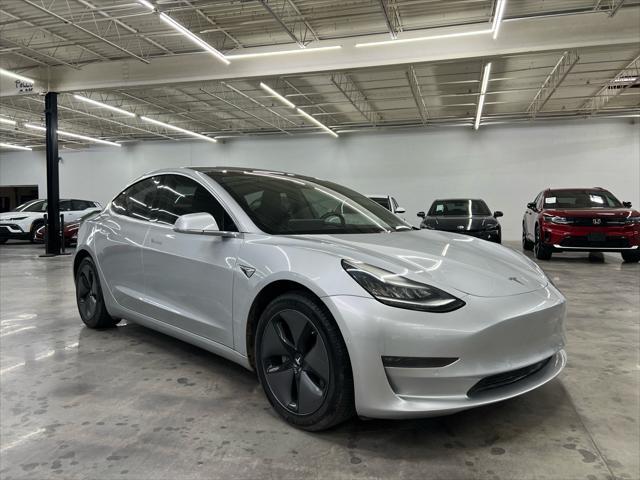 used 2018 Tesla Model 3 car, priced at $17,000