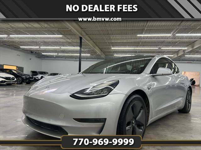 used 2018 Tesla Model 3 car, priced at $17,000