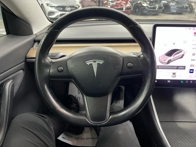 used 2018 Tesla Model 3 car, priced at $17,000