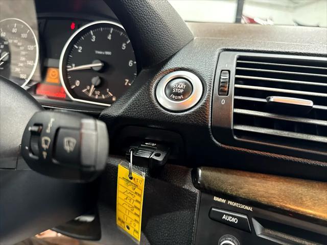 used 2011 BMW 128 car, priced at $8,500