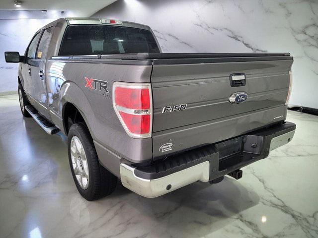 used 2014 Ford F-150 car, priced at $14,500