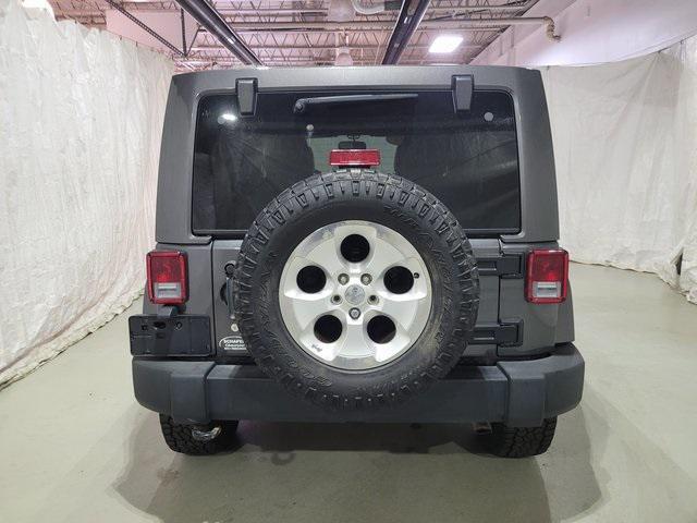 used 2014 Jeep Wrangler Unlimited car, priced at $16,700