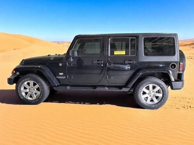 used 2011 Jeep Wrangler Unlimited car, priced at $12,500