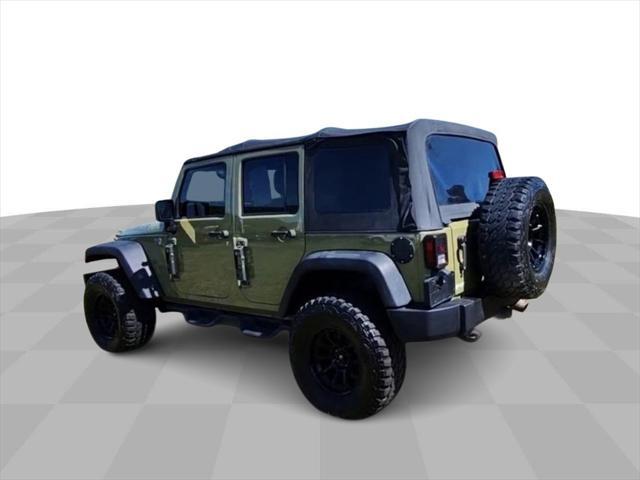 used 2013 Jeep Wrangler Unlimited car, priced at $15,894