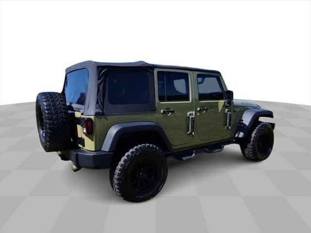 used 2013 Jeep Wrangler Unlimited car, priced at $15,894