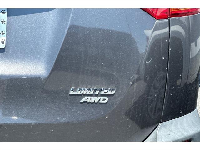 used 2013 Toyota RAV4 car, priced at $15,999