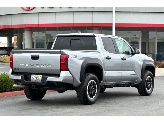 used 2024 Toyota Tacoma car, priced at $49,999