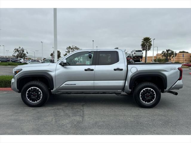 used 2024 Toyota Tacoma car, priced at $49,999