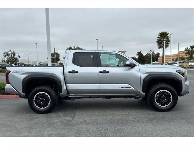used 2024 Toyota Tacoma car, priced at $49,999