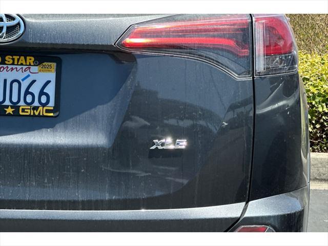 used 2018 Toyota RAV4 car, priced at $22,999
