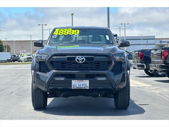 used 2025 Toyota Tacoma car, priced at $48,999