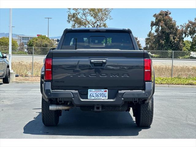 used 2025 Toyota Tacoma car, priced at $48,999