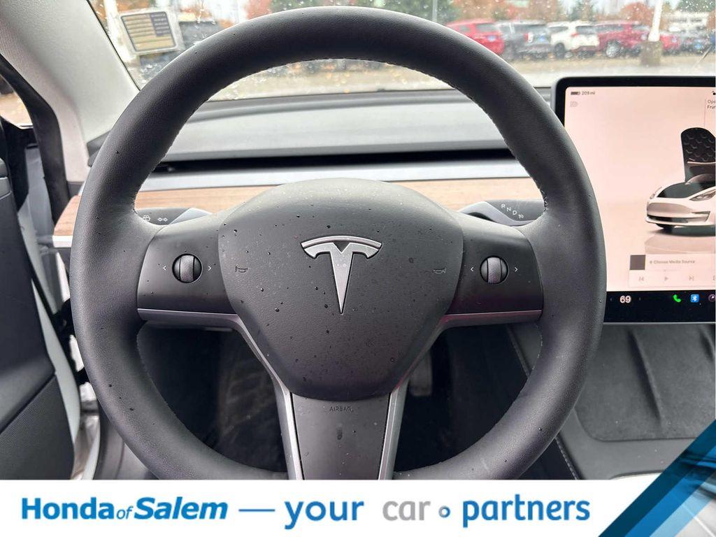 used 2023 Tesla Model 3 car, priced at $25,995