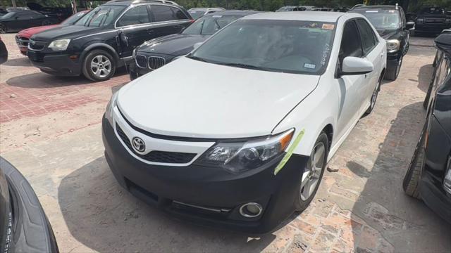 used 2014 Toyota Camry car, priced at $2,850
